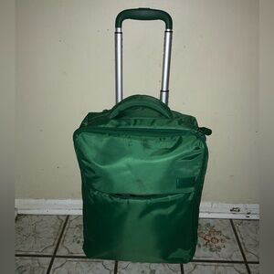 Lipault Paris - CarryOn wheel Luggage with key. Has minor stains as pictured.
